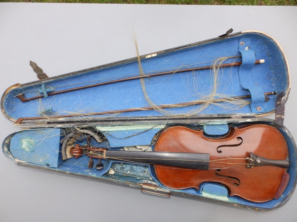 A Stradivarius copy violin by E R Schmidt & Co with 14.25" two piece back, together with two bows in - Image 2 of 12