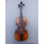 An antique violin with 13" two piece back and bow in wooden case.