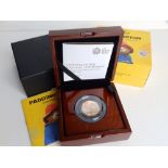 A boxed Royal Mint 'Paddington At The Palace' 2018 50p Gold Proof Coin, with paperwork - No.322.