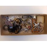 A quantity of beads & other costume jewellery