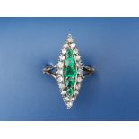 An old emerald & diamond paste marquise shaped cluster ring on 18ct shank. Finger size R.