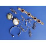 Three Arts & Crafts silver brooches and six other pieces. (9)