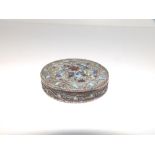 A 19thC cloisonne enamelled circular silver wafer box, 2.3" diameter.