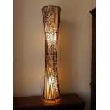 A canework & fabric electric floor lamp, of slender waisted form, 59" high.