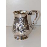 A Victorian floral embossed mug , engraved 'CS' - D&S, Sheffield 1858, 5.5" high.