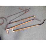 Two bone handled riding crops and three others. (5)