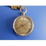 A lady's 18ct gold pocket watch having gold dial and floral engraved decoration to case, 1.6"