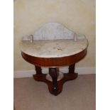 A Victorian semi-circular marble top washstand and three towel rails. (4) Separate viewing