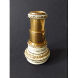 A 19thC two-drawer gilt brass & ivorine monocular, having ornate banded decoration, 3.75" extended.