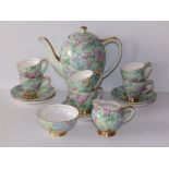 A 15 piece Empire China 'Lilac Time' chintz pattern coffee set.