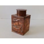 A square copper tea caddy by H. Dyer, Mousehole, embossed with a galleon to one side, 5" high.