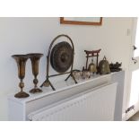 A brass gong. 16" high overall, a pair of Eastern silvered metal vases and other Eastern items.