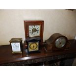 A brass carriage clock, 4.25" high excluding handle. A 19thC American alarm mantel clock and two