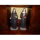 A pair of painted plaster religious figures - Priest & Nun, 23.5" high. (2) Separate viewing