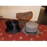 A Moss Bros. grey felt top hat, size 7 3/8 and a 'Best London Finish' black top hat, together with