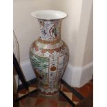 A 20thC Chinese porcelain floor vase, decorated panels and lappets, 32" high. Separate viewing