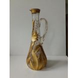 A tall late Victorian/art nouveau slender cut glass jug having gilded & engraved overall