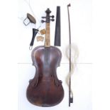 An old (distressed) violin in case, together with a bow by A. Hermann. (2)