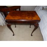 A walnut folding rectangular tea table on pad feet, Width 30". Separate viewing arrangements by