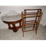 A Victorian semi-circular marble top washstand and two towel rails. (3) Separate viewing