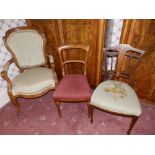 A French style upholstered open armchair, an inlaid occasional chair and one other. (3) Separate