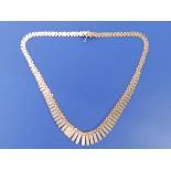 An 18ct gold fringe necklace, 17.25".