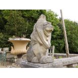A pair of modern cast concrete lions in the art deco style, 23" high. Separate viewing