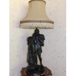 A large reproduction style bronze patinated resin figural table lamp - 'Wedded', the figures 26"