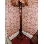 A carved standard lamp of bamboo shoot form, Height 65". Separate viewing arrangements by