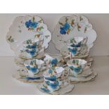 31 pieces of Wileman & Co. Foley 'Japanese Rose' pattern fluted tea china, comprising a pair of 9.5"