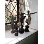 A reproduction bronze dancing girl, 14.5" high, a bronze cherub playing a violin and two other metal