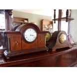 An inlaid mahogany mantel clock, 12.5" across and one other. (2) Separate viewing arrangements by