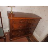 A Victorian mahogany chest two short & three long graduated drawers having turned wooden handles,
