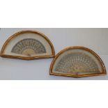 A pair of giltwood fan display cases for wall mounting, 20.5" across, each containing a 19thC sequin