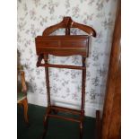 A reproduction mahogany valet stand, Height 48". Separate viewing arrangements by appointment.