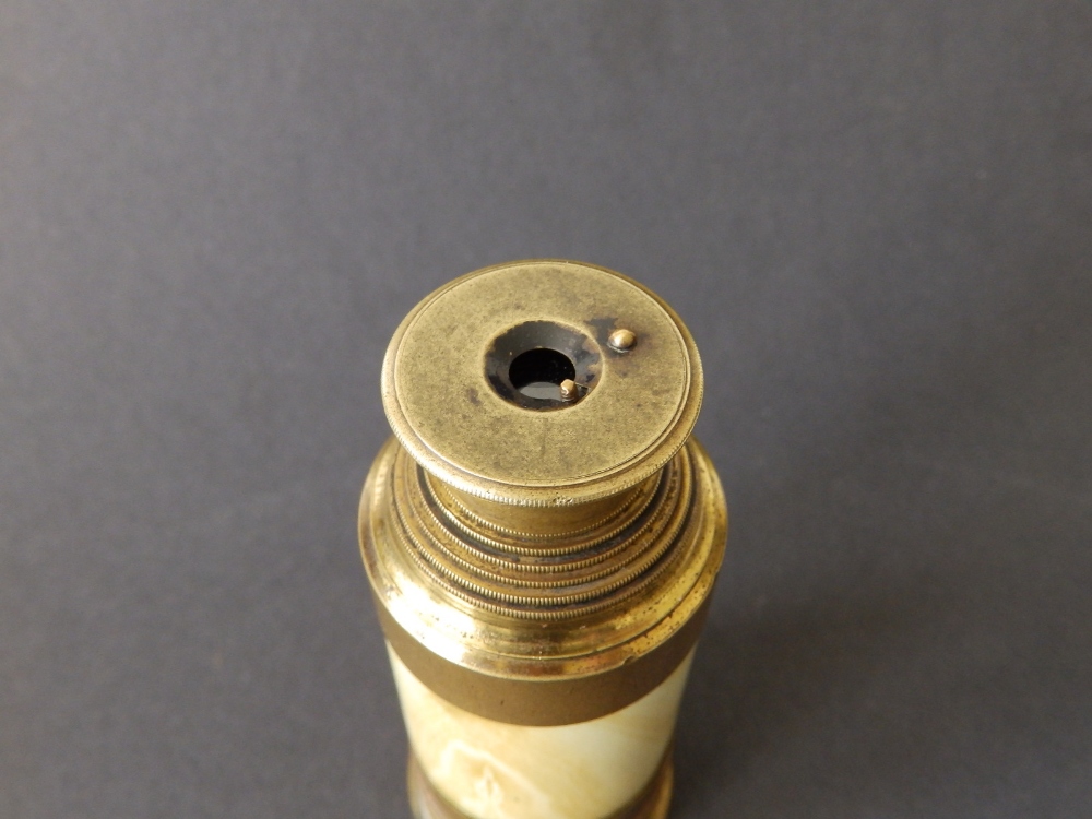 A 19thC brass & ivory six-drawer monocular telescope with dust cap, 12" extended. This lot will - Image 3 of 4