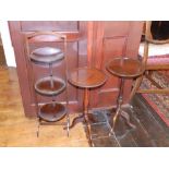 Two tripod wine tables and a folding circular cakestand. (3) Separate viewing arrangements by