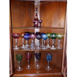 A quantity of coloured cut hock and other drinking glasses. Separate viewing arrangements by