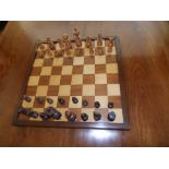A wooden chess set with board, the kings 4" high - a/f. Separate viewing arrangements by