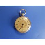 A lady's 18ct gold pocket watch having gold dial, floral engraved decoration to case, 1.5"