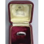 A boxed Garrard & Co. diamond set 18ct white gold eternity ring, claw set with 16 brilliant cut