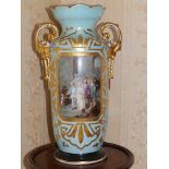 A 19thC colour painted & printed porcelain two-handled vase decorated with a panel depicting a