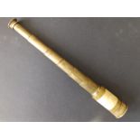 A 19thC brass & ivory six-drawer monocular telescope with dust cap, 12" extended. This lot will