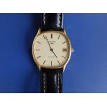 A gent's gold plated Longines Automatic wrist watch with date indicator, on replacement leather