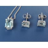 A small modern rectangular aquamarine pendant necklace and matching earrings in 18ct white gold. (