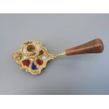 A small ormolu chamberstick in the French 18thC style, set with hardstone panels in alternating