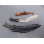 A horn-handled kukri in sheath, 16.5" overall, one other together with a small Eastern knife, (3)