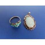 A small old turquoise set gold cluster ring and a damaged opal pendant, 1.1" overall height. (2)