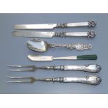 A pair of Australian art nouveau silver-handled two-prong forks, a New Zealand jade-handled Sterling