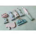 A collection of Ancient Egyptian faience amulets - Bes, Anubis, Sekhmet, Eye of Horus, Horus, etc,